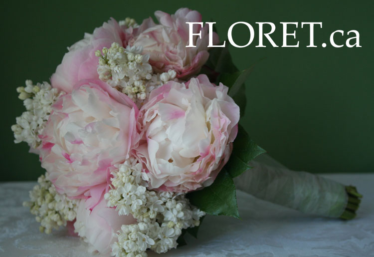 Bouquet of creamy pink peonies with white French lilace